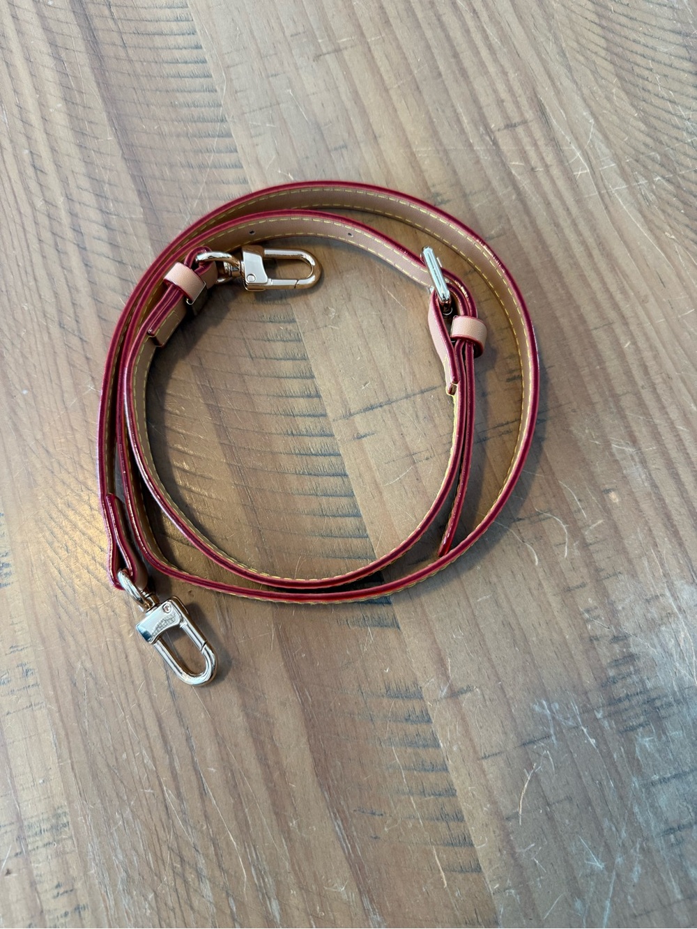 Adjustable Pink Leather Crossbody Strap with golden Hardware